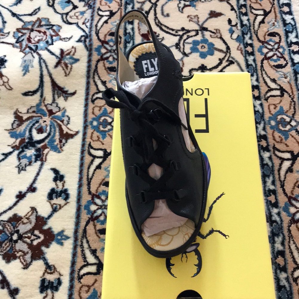 Fly London Tie up comfort platform fine leather
